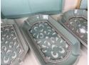 Caspari Square Lizard Coasters In Teal With A Teal Leather Elie Tahari Home Tray And Three Serving Trays