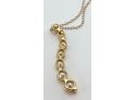 14K Yellow Gold And Seven Graduating Round Cubic Zirconia Pendant On Chain