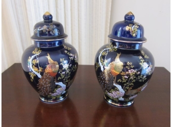 TWO ORIENTAL BLUE VASES WITH LIDS