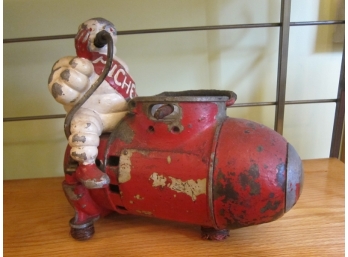 Vintage  Cast Iron Michelin Man On Air Compressor Figure