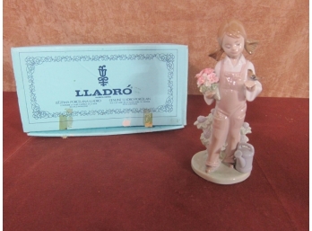 Lladro Figurine.Spring Girl With Bird On Hand And Flowers