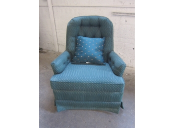 A BLUE UPHOLSTERY CHAIR