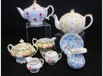 Group Lot Of Tea Pots And Creamers