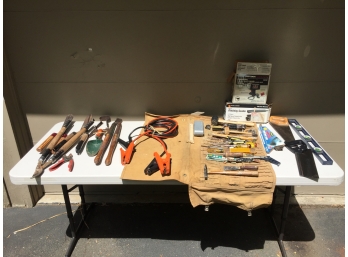 Table Full Of Garden And Hand Tools