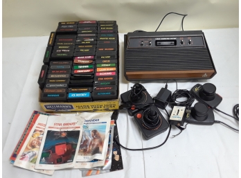 Atari 2600 With Accessories & 60 Games