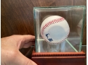 Hank Aaron Autographed Baseball In Glass Display Case