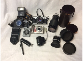 Box Of Vintage Canon Cameras Telephoto Lenses And Other Equipment