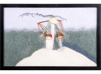 An Intricate Framed Embroidery Of A Figure In The Rice Field