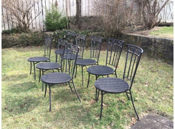 Eight Wrought Iron Chairs With Woven Nylon Rope Seats