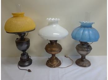Three Oil Lamps With Shades