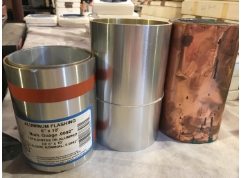 2 Rolls Of Aluminum Flashing And A Roll Of Copper Flashing