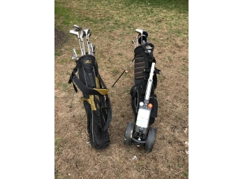 Two Sets Of Golf Clubs