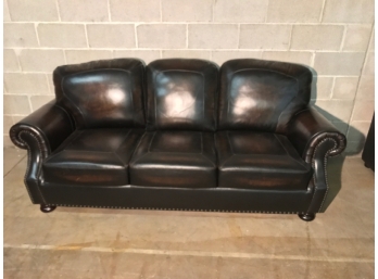 Very Nice Dark Brown Leather Three Seat Sofa With Curved Arms And Small Brass Tacks