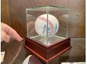 Nolan Ryan Autographed Baseball In Glass Display Case With COA