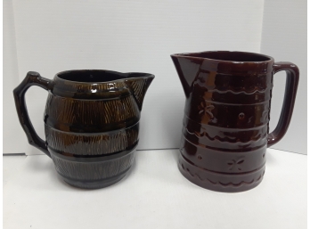 Two Ceramic Pitchers - Roseville And Marcrest
