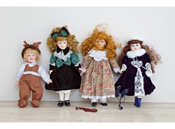 Four Decorative Holiday Dolls