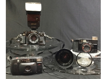 Three Vintage Cameras  - Two Canon & One Minolta & A Sigma Zoom Lens