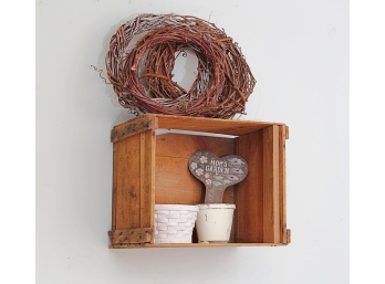 Cute Gardening Themed Crate Mounted As A Wall Decoration