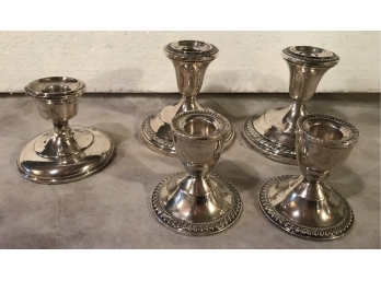 Five Weighted Sterling Candle Stick Holders
