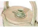 Signed Pottery Teapot In A Light Green Glaze