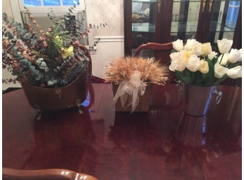 Dried And Faux Flowers In Various Holders