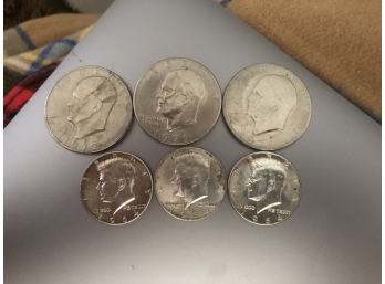 Three Eisenhower Dollars And Three Kennedy Half Dollars