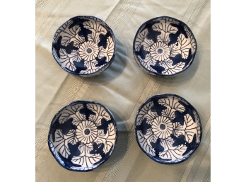 Four Small Blue And White Bowls