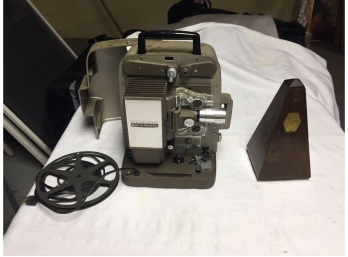 Vintage Bell And Howell Projector And Metronome