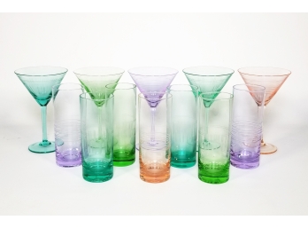 A Collection Of Colorful Cocktail Glasses