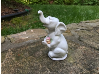 Lladro Elephant With A Bouquet Of Flowers