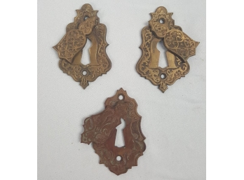 Three Bronze Keyhole Escutcheons