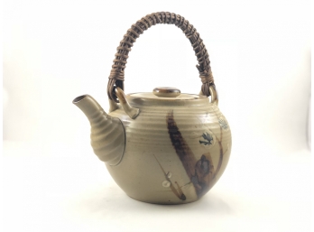 Vintage Ceramic Asian-Style Tea Pot With Rattan Handle
