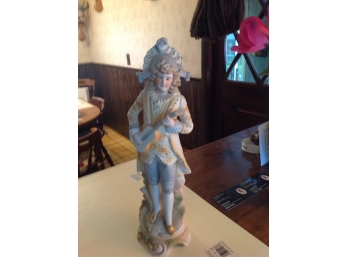 Porcelain Figurine Playing Musical Instrument
