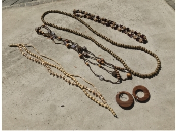 Group Of Wooden Necklaces And Earrings