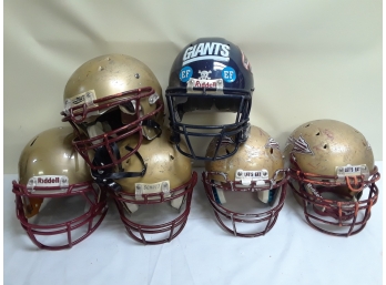 Six Football Helmets