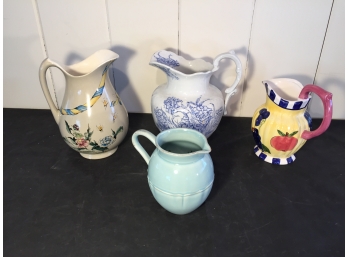 Four Hand Painted Ceramic Pitchers