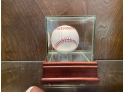 Hank Aaron Autographed Baseball In Glass Display Case