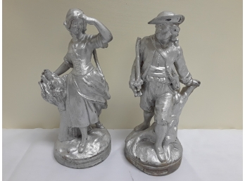 Two White Metal Clock Toppers