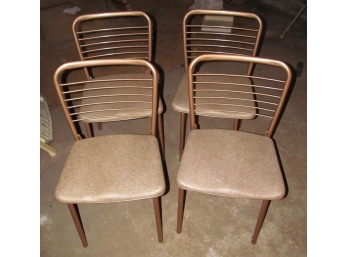Four 1950's Cosco Folding Chairs