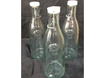 Three  100% Recycled Glass Bottles
