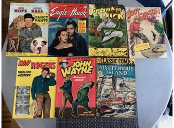 Film And Adventure Themed Vintage Comics Including Lucille Ball, John Wayne, And Will Rogers