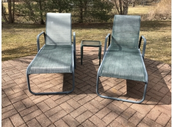 Two Outdoor Chaise Lounges And Side Table