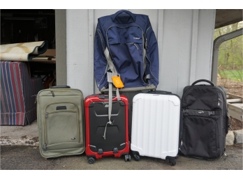 Five Carry-on Sized Suit Cases