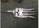 Sterling Silver Serving Fork And Two Napkin Rings - 2.205 TOZ