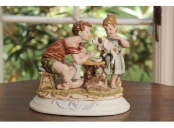 Porcelain Figural Group Of Children With Puppies