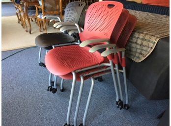 Five Herman Miller Steel And Molded Plastic Stack Chairs On Casters
