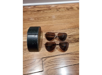 2 Pairs Of Sunglasses And Prada Case