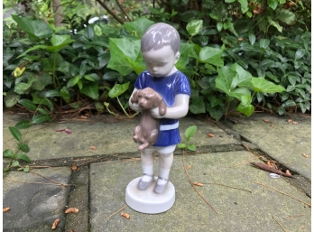 Royal Copenhagen Figurine Of A Boy With His Puppy