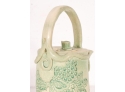 Signed Pottery Teapot In A Light Green Glaze