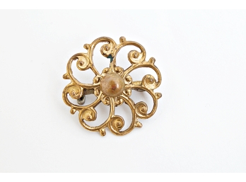 Vintage Circular Filigree Brooch With A Small Center Stone